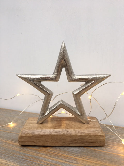 Silver Star on Wooden Block image 0